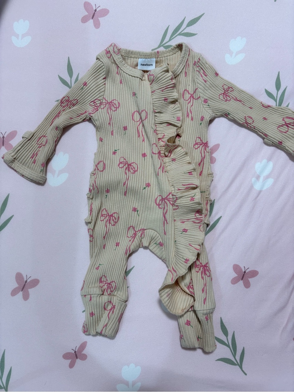 Amazon Cream Ribbed Baby Footie with Pink Bow Print and Ruffle